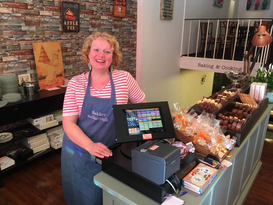 Ondernemer aan de kassa